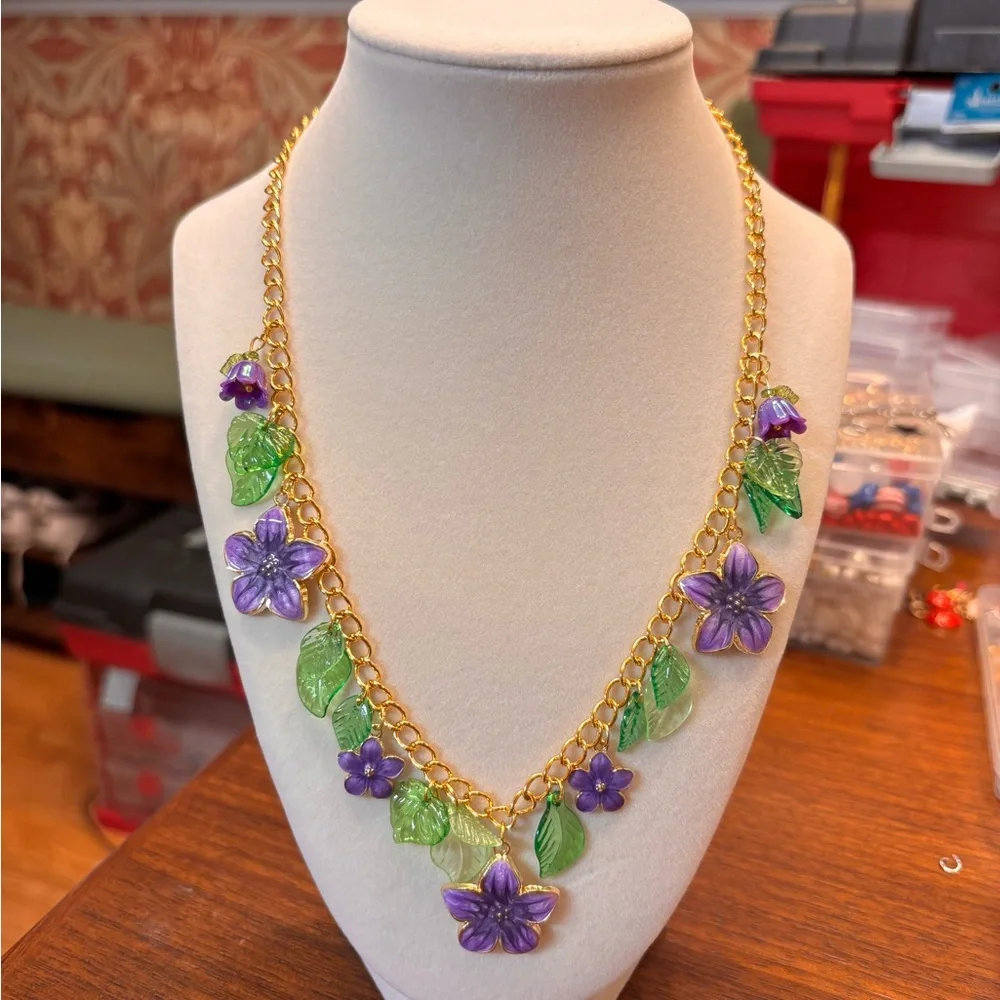 Floral new handmade charmed Gold and Purple Necklace with green leaves